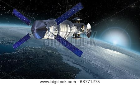 Satellite surveying Earth. Elements of this image furnished by NASA
