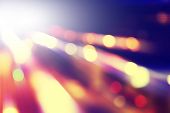Defocused abstract lights background in motion blur. 