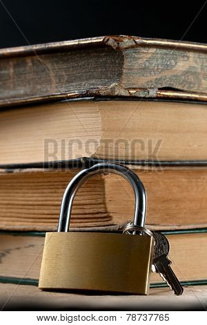 Pile Of Old Books And Keylock