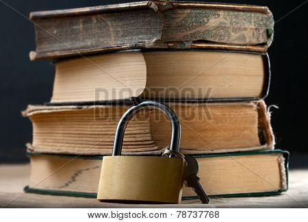 Pile Of Old Books And Keylock