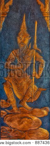 Metal Relief Picture Of Buddist Diety At Wat Kaew Korawaram Temple