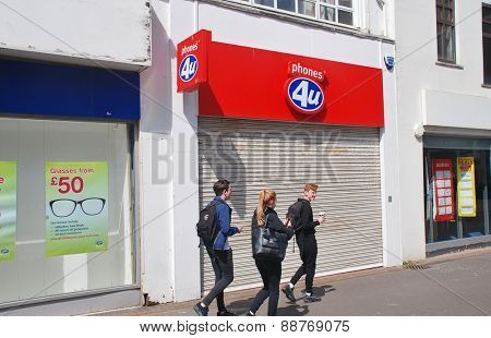 HASTINGS, ENGLAND - APRIL 22, 2015: The exterior of a Phones 4U mobile phone store. Founded in 1987, all 720 UK outlets closed down in September 2014 after the company went into administration.