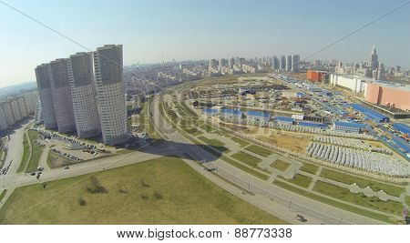 MOSCOW, RUSSIA - APRIL 20, 2014: Cityscape with dwelling buildings around Hodynskoe field at spring sunny day, aerial view