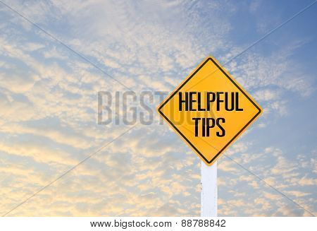 Road Sign Indicating Helpful Tips On Blurred Sky Background