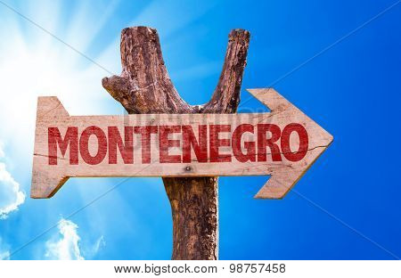 Montenegro wooden sign with sky background