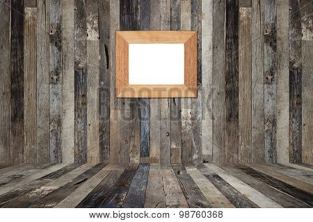 Wooden Picture Frame On The Old Wooden Wall