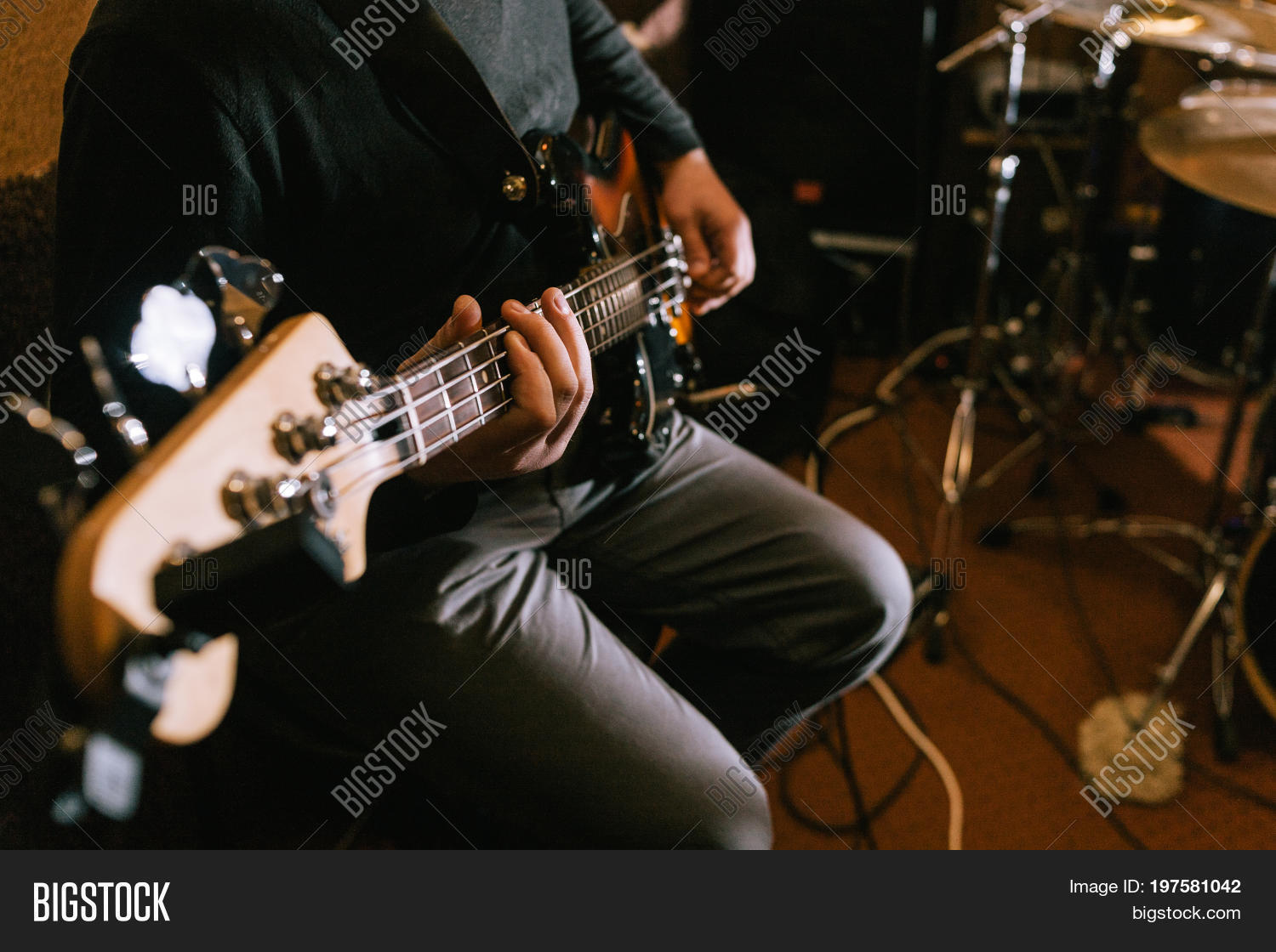 Guitarist Playing Bass Image & Photo (Free Trial) | Bigstock