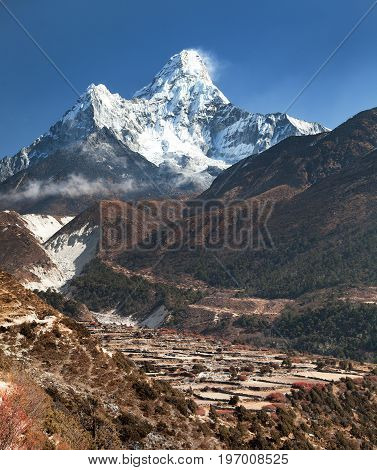 View of mount Ama Dablam and Pangboche village on the way to Everest Base Camp with beautiful blue sky Sagarmatha national park Khumbu valley Nepal