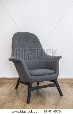 armchair in grey with contemporary design