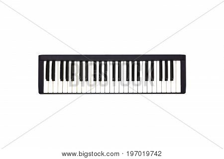 Isolated Mini Piano Keyboard Music instrumental for Computer midi song writer on white background.