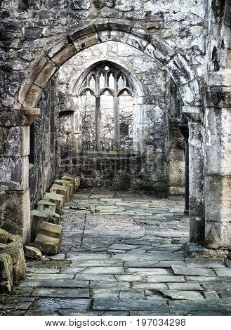 old ruined medieval church in heptonstall with columns and windows