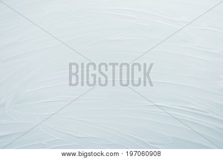 Soaped surface. Abstract simple background, backdrop  the subject of cleaning. White, light shades. Top view. Close-up. Stock photo .