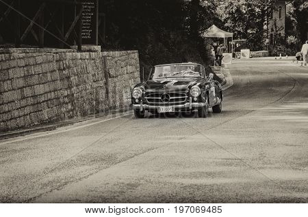 GOLA DEL FURLO, ITALY - MAY 19: MERCEDES-BENZ 190 SL 1956 on an old racing car in rally Mille Miglia 2017 the famous italian historical race (1927-1957) on May 19 2017