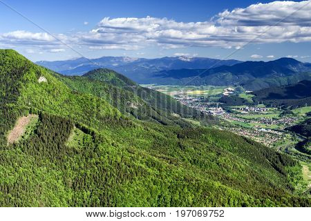 Beautiful view from hill Hrdos (Ostre) in Mala Fatra national park. Country landscape. Town Ruzomberok at backround