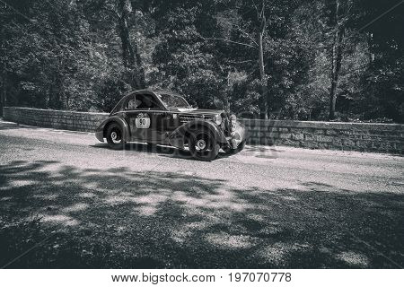 GOLA DEL FURLO, ITALY - MAY 19:FIAT 508 CS MM BERLINETTA 1935 on an old racing car in rally Mille Miglia 2017 the famous italian historical race (1927-1957) on May 19 2017