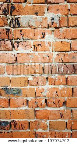 Background brick wall with black spots. texture. brickwork