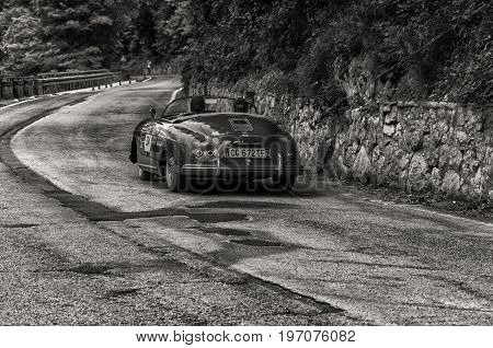 GOLA DEL FURLO, ITALY - MAY 19: PORSCHE 356 1500 SPEEDSTER 1954 on an old racing car in rally Mille Miglia 2017 the famous italian historical race (1927-1957) on May 19 2017