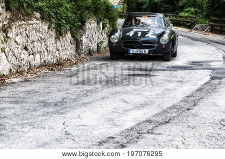 GOLA DEL FURLO, ITALY - MAY 19: MERCEDES-BENZ 300 SL COUPÉ W 198 1955 on an old racing car in rally Mille Miglia 2017 the famous italian historical race (1927-1957) on May 19 2017