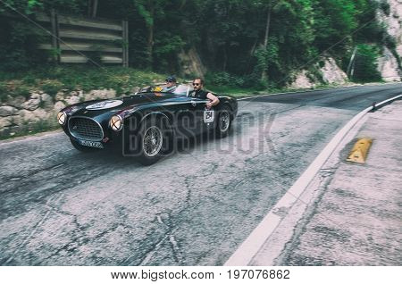 GOLA DEL FURLO, ITALY - MAY 19: FERRARI 225 S SPIDER VIGNALE 1952 on an old racing car in rally Mille Miglia 2017 the famous italian historical race (1927-1957) on May 19 2017