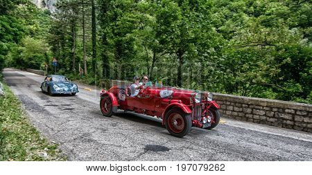 GOLA DEL FURLO, ITALY - MAY 19: LAGONDA M45 RAPIDE 1935 on an old racing car in rally Mille Miglia 2017 the famous italian historical race (1927-1957) on May 19 2017
