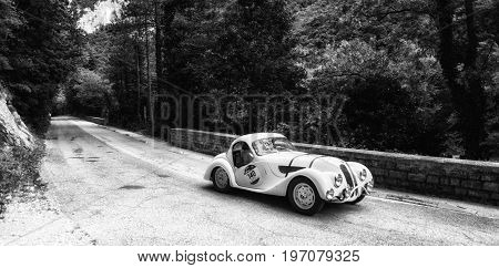 GOLA DEL FURLO, ITALY - MAY 19: BMW 328 COUPÉ 1937 on an old racing car in rally Mille Miglia 2017 the famous italian historical race (1927-1957) on May 19 2017