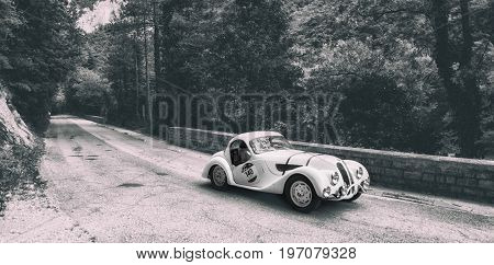 GOLA DEL FURLO, ITALY - MAY 19: BMW 328 COUPÉ 1937 on an old racing car in rally Mille Miglia 2017 the famous italian historical race (1927-1957) on May 19 2017