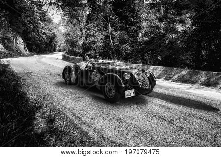 GOLA DEL FURLO, ITALY - MAY 19: HEALEY 2400 SILVERSTONE D-TYPE 1949 on an old racing car in rally Mille Miglia 2017 the famous italian historical race (1927-1957) on May 19 2017