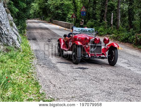 GOLA DEL FURLO, ITALY - MAY 19: ALFA ROMEO 6C 1750 GRAN SPORT 1930 on an old racing car in rally Mille Miglia 2017 the famous italian historical race (1927-1957) on May 19 2017