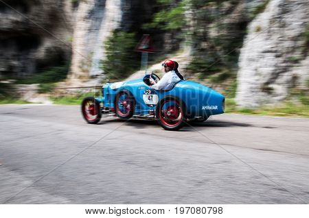 GOLA DEL FURLO, ITALY - MAY 19: AMILCAR CGSS 1928 on an old racing car in rally Mille Miglia 2017 the famous italian historical race (1927-1957) on May 19 2017