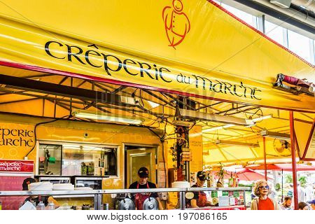 Montreal, Canada - May 28, 2017: Jean Talon Market Creperie Yellow Restaurant Sign Inside Building C