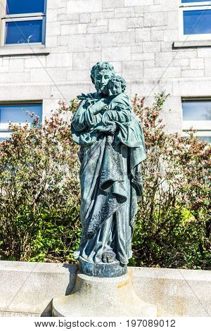 Montreal, Canada - May 28, 2017: St Joseph's Oratory On Mont Royal With Statue Of The Saint Holding 