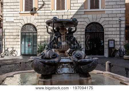 Rome Italy - August 20 2016: The Turtle Fountain in Rome (Fontana delle Tartarughe) It is a fountain of the late Italian Renaissance located in Piazza Mattei