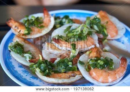 Vietnamese food and vegetable on dish isolated on white background. Nha trang, Vietnam.