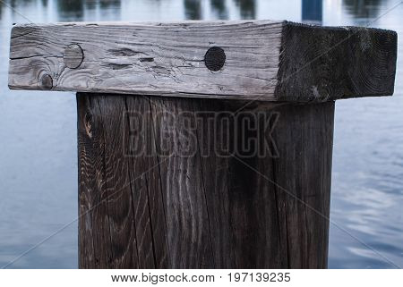 old pier over water background and texture for graphic design.