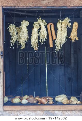 Hanging bundles of smoked cheese in Adygea, Russia.