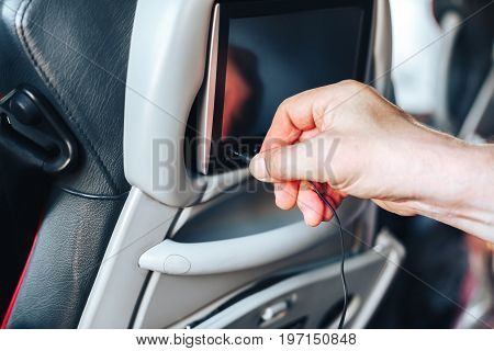 Long-distance international bus of the raised comfort with built in seat chair, a TV or a tablet where they can watch movies during road and listen to music, surf the Internet