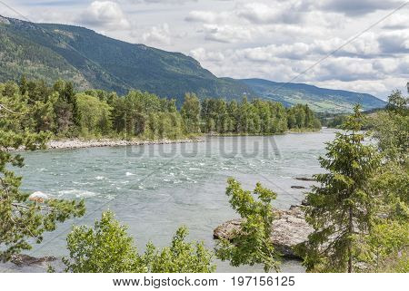 Rauma river in Norwegian landscape in summer