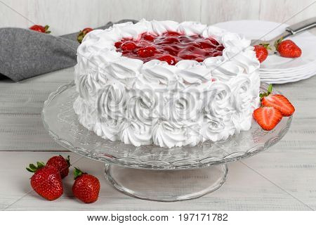 Delicious strawberry white cake shot close-up in decor