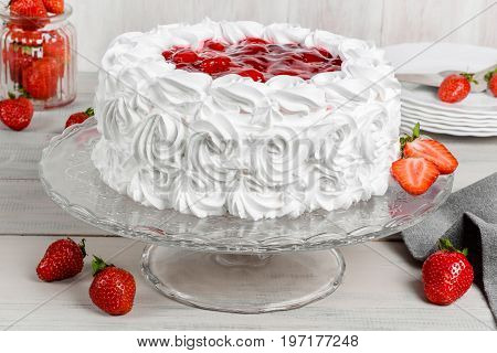 Delicious strawberry white cake shot close-up in decor