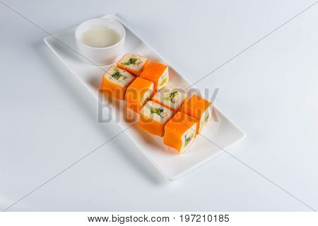 Dessert Maki Sushi - Roll With Various Fruit In Rice Pudding And Coconut Flakes