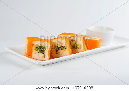 Dessert Maki Sushi - Roll With Various Fruit In Rice Pudding And Coconut Flakes