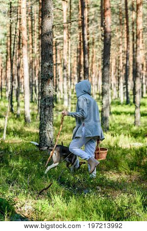 Young Woman Enjoying Nature In Forest