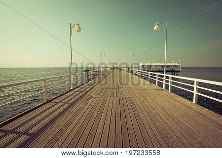 JurataPoland-September 92016:Wooden pier in Jurata town on coast of Baltic Sea Hel peninsula Poland