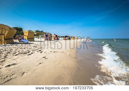 JurataPoland-September 92016:Wicker chairs on Jurata beach on sunny summer day Hel peninsula Baltic Sea Poland
