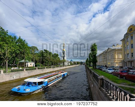 SAINT PETERSBURG/ RUSSIA - JULY 2, 2017. View of the embankment of the Krjukov canal and the belfry of St. Nicholas Cathedral. Saint Petersburg, Russia.