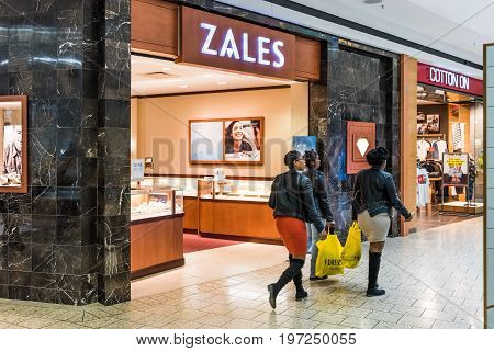 Fairfax, Usa - February 18, 2017: Zales Sign Inside In Mall Jewelery Store With People Walking