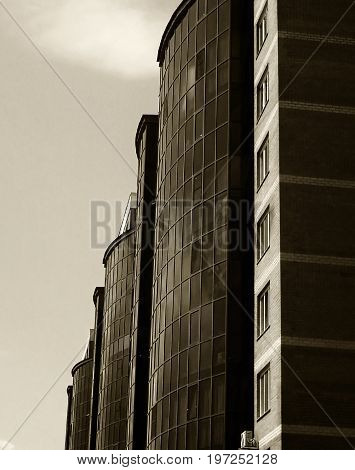 Building. Monochrome. Modern building in a monochrome image. Modern building.  Building background. Architectural background.Architecture. Modern architecture. House. Monochrome building. Art of building.