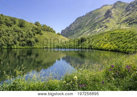 Lake valley of Dzitaku in the mountains of the Caucasian range, Krasnaya Polyana, Sochi, Russia