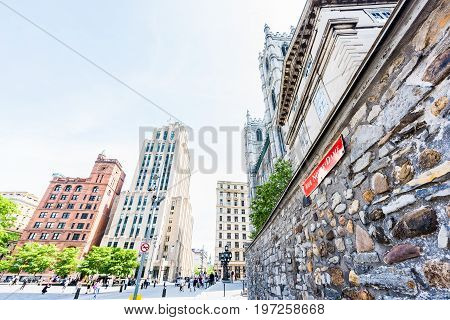 Montreal, Canada - May 28, 2017: Old Town Area With Notre Dame Basilica Street Sign In Red During Da
