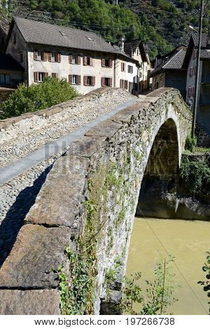 Giornico, Switzerland - 7 June 2016: Roman bridge at Giornico on Leventina valley Switzerland